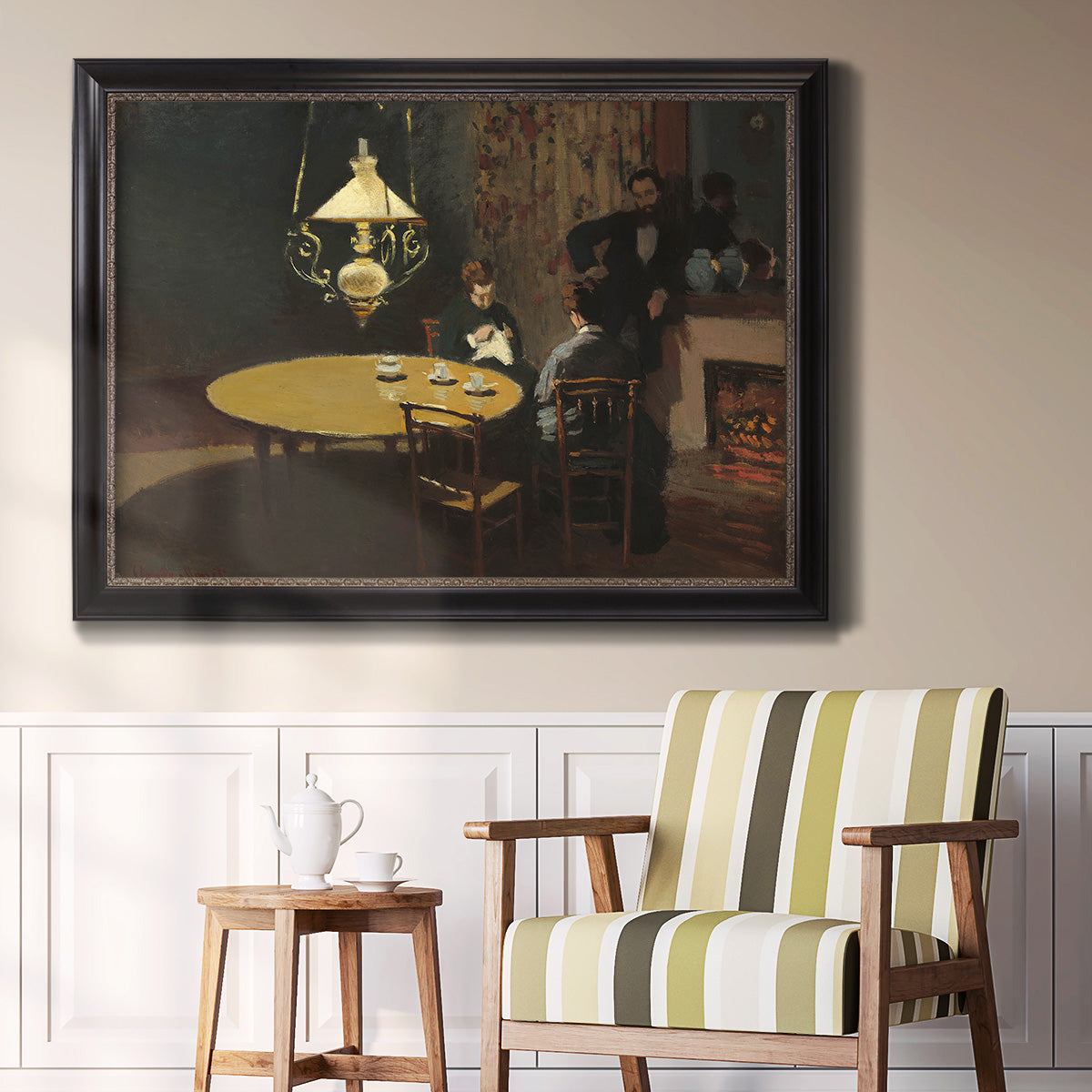 Impressionist domestic interior scene by Claude Monet in an ornate black frame with gilded inner detail displayed in a light-toned interior setting.