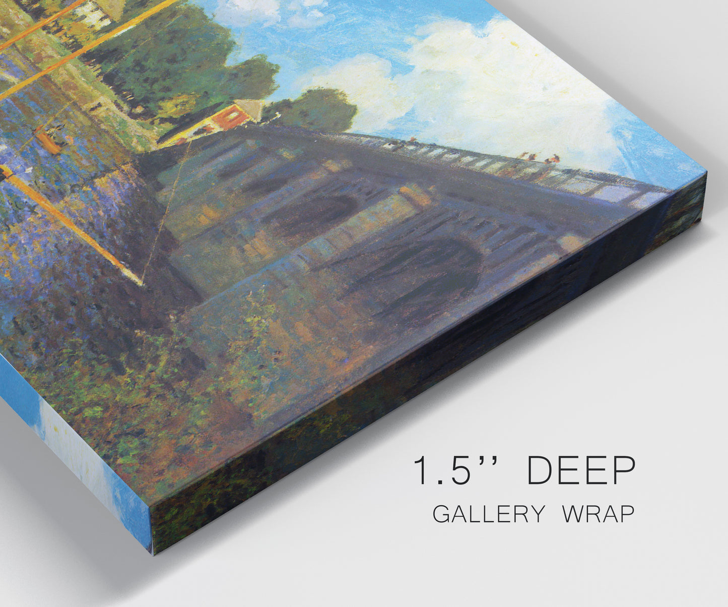 Close-up view of wrapped canvas corner featuring bridge crossing river landscape.