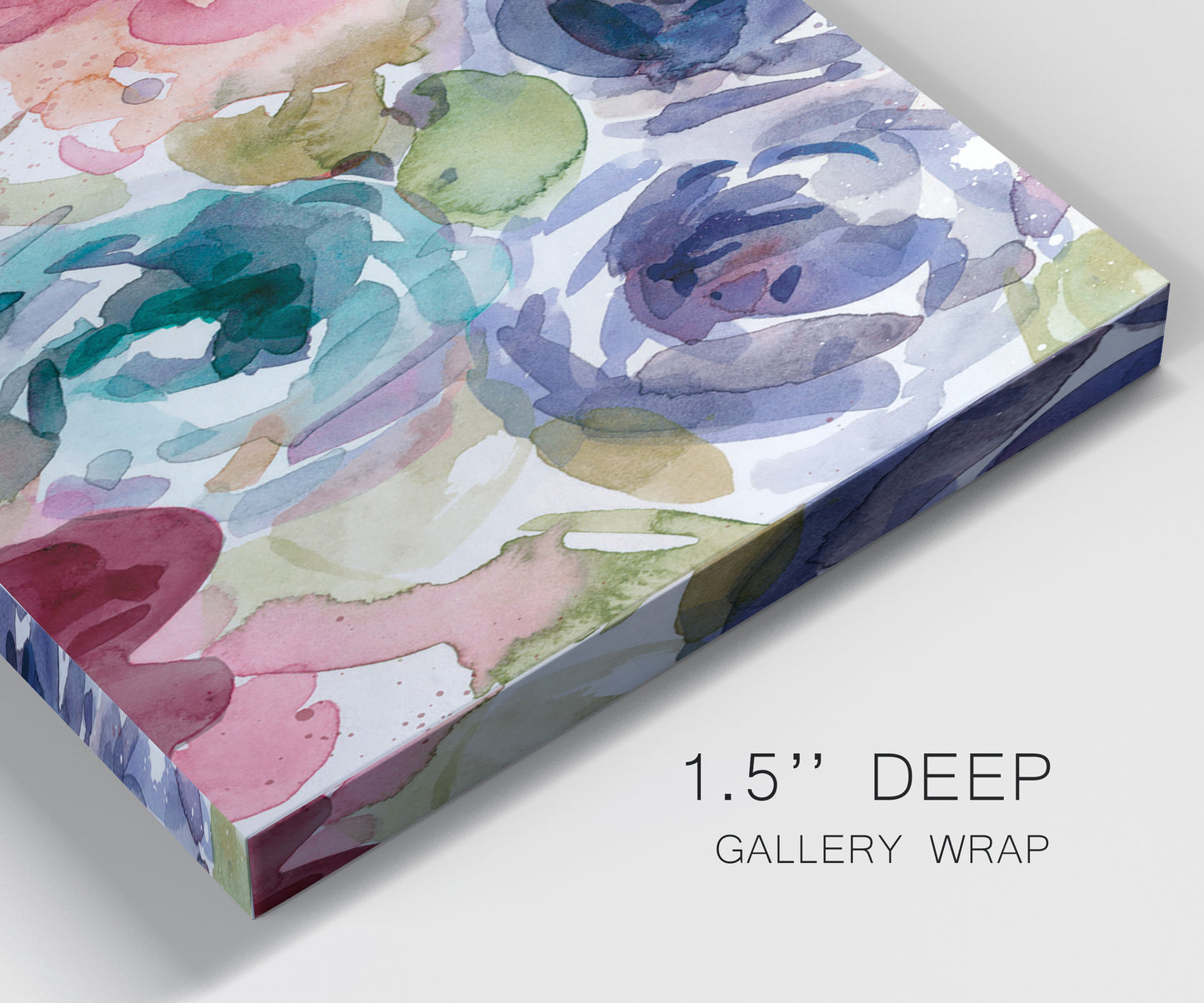 Close-up view of wrapped canvas corner featuring soft floral watercolor composition.