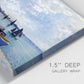 Close-up view of wrapped canvas corner featuring busy beach scene with shoreline.