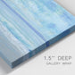 Close-up view of wrapped canvas corner featuring rolling ocean surf along shoreline.