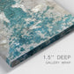 Close-up view of wrapped canvas corner featuring layered mineral abstract textures.