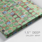 Close-up view of wrapped canvas corner featuring geometric fractal abstract slot pattern.
