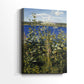 Side view of a canvas art print of a detailed view of flowering plants in a soft natural setting, showing gallery-wrapped depth.
