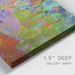 Close-up view of wrapped canvas corner featuring vibrant abstract with dramatic motion.