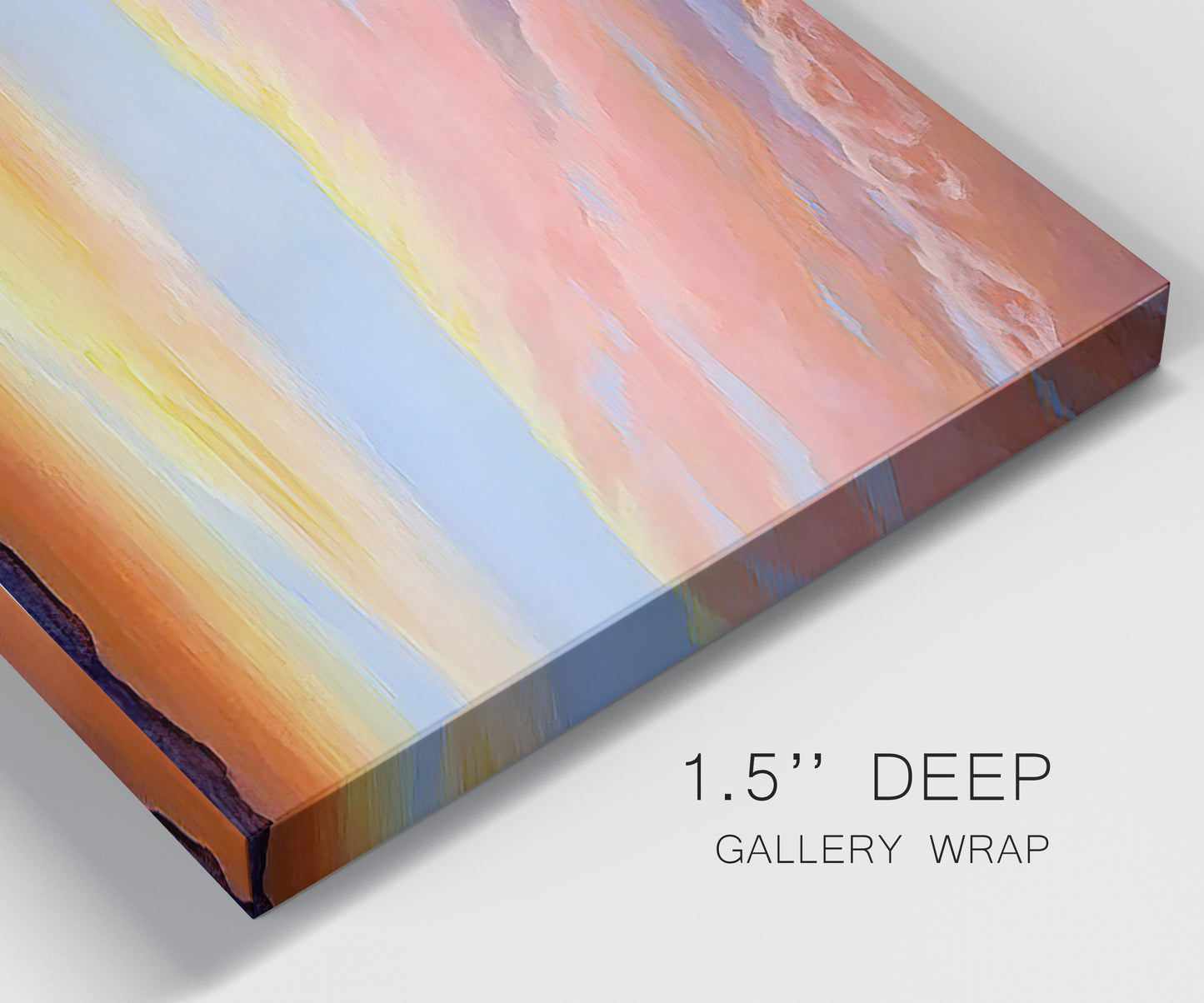 Close-up view of wrapped canvas corner featuring glowing sunset sky over landscape.