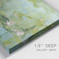 Close-up view of wrapped canvas corner featuring muted water lily pond.