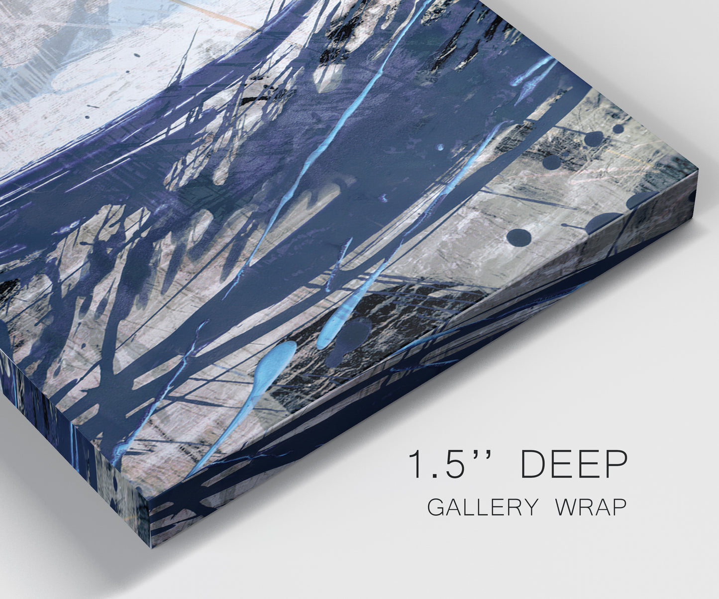 Close-up view of wrapped canvas corner featuring layered blue abstract texture.