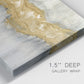 Close-up view of wrapped canvas corner featuring flowing abstract golden tones.