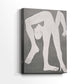Side view of a canvas art print of a stylized human figure with flat tones and clean lines, showing gallery-wrapped depth.