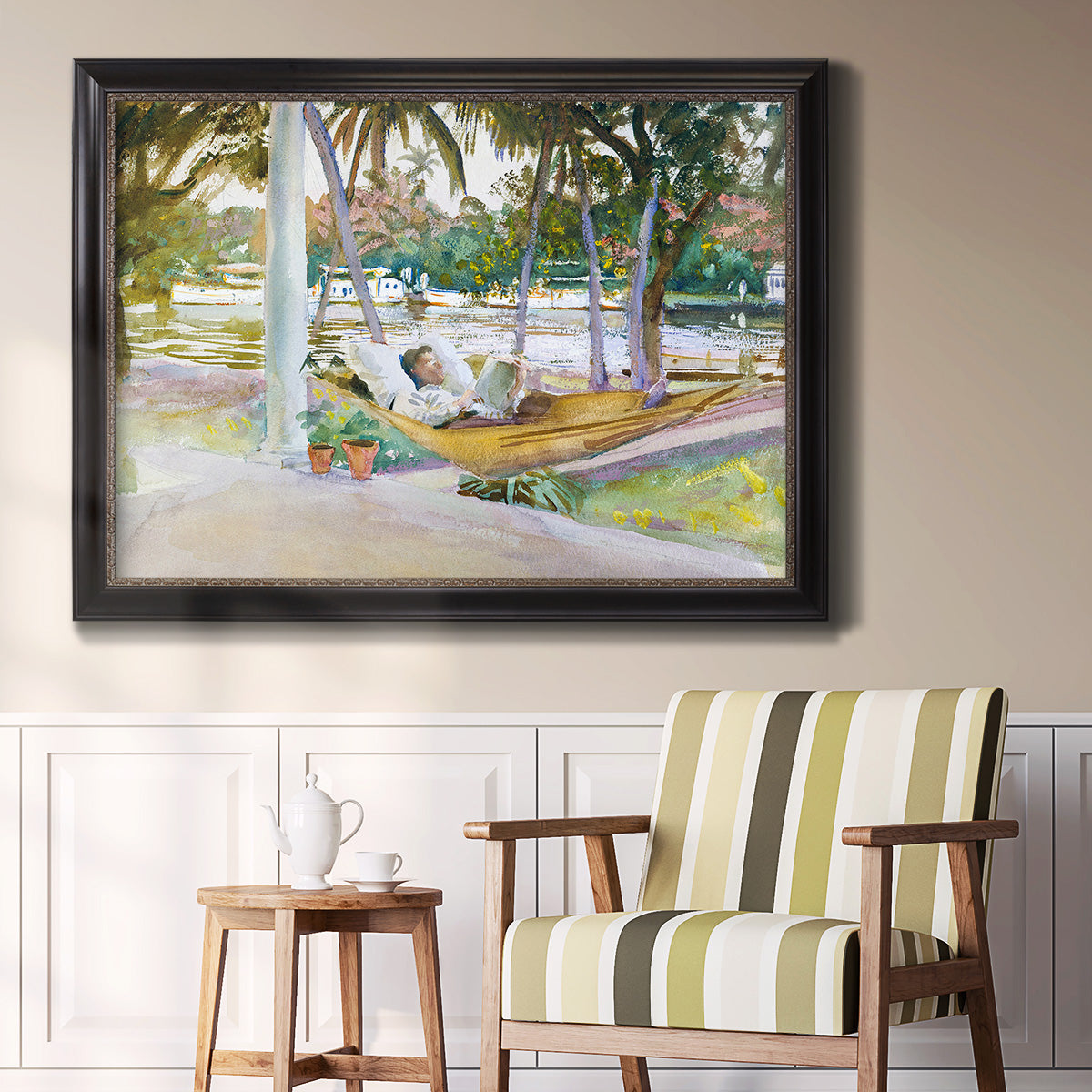 Impressionist leisure portrait scene by John Singer Sargent in an ornate black frame with gilded inner detail displayed in a light-toned interior setting.