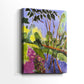 Side view of a canvas art print of a bright landscape with simplified forms and strong color, showing gallery-wrapped depth.