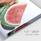 Close-up view of wrapped canvas corner featuring impressionist market still life.