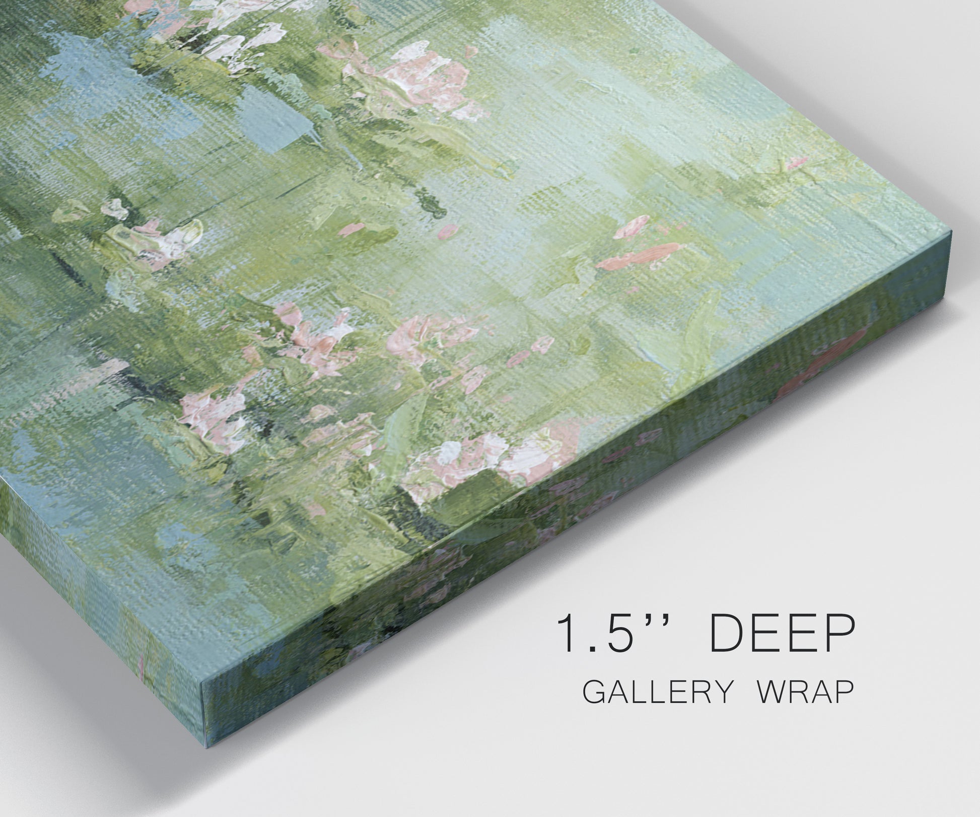 Close-up view of wrapped canvas corner featuring soft green water lilies.