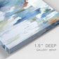 Close-up view of wrapped canvas corner featuring flowing abstract color movement.