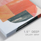 Close-up view of wrapped canvas corner featuring bold pink mid century abstract portal.