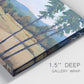 Close-up view of wrapped canvas corner featuring quiet morning landscape with trees.