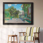 Impressionist residential landscape at Argenteuil by Claude Monet in an ornate black frame with gilded inner detail displayed in a light-toned interior setting.