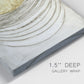Close-up view of wrapped canvas corner featuring circular abstract energy forms.