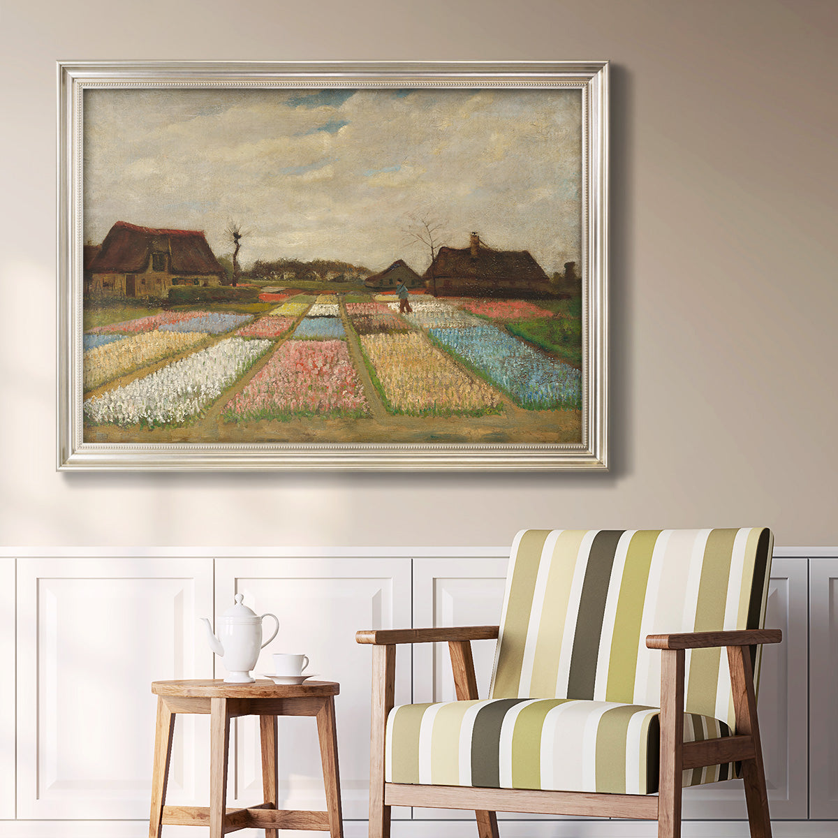 Impressionist Dutch bulb field landscape by Vincent van Gogh in an ornate champagne frame displayed in a light-toned interior setting.