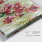 Close-up view of wrapped canvas corner featuring colorful floral garden composition.