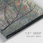 Close-up view of wrapped canvas corner featuring spring countryside with fresh foliage.