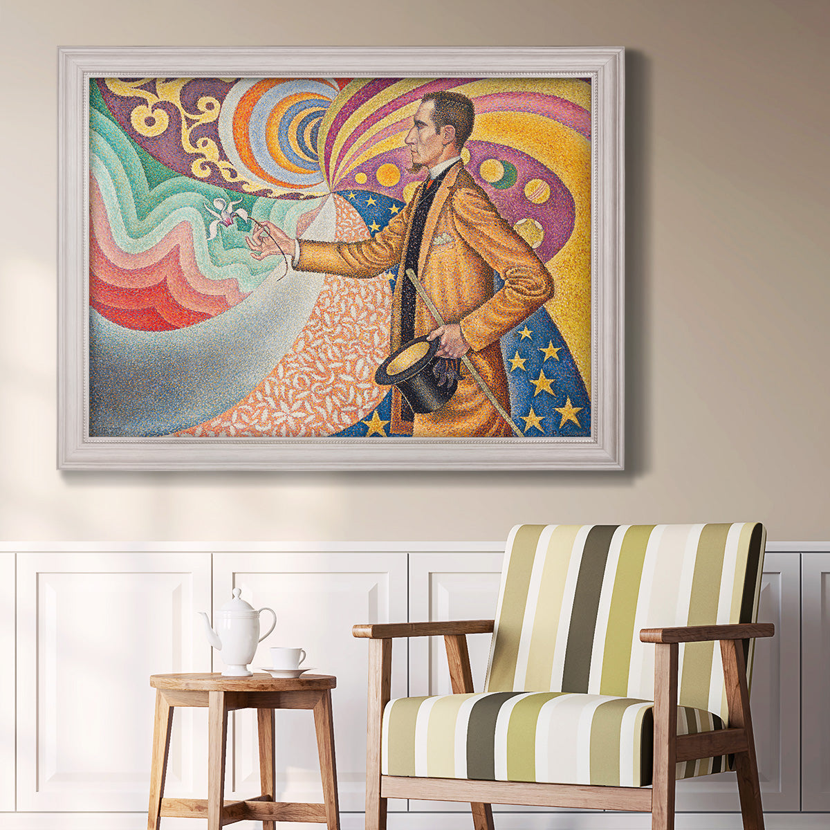 Neo-impressionist abstract portrait by Paul Signac in an ornate weathered white frame displayed in a light-toned interior setting.