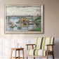Impressionist river bridge scene on an overcast day by Claude Monet in an ornate champagne frame displayed in a light-toned interior setting.