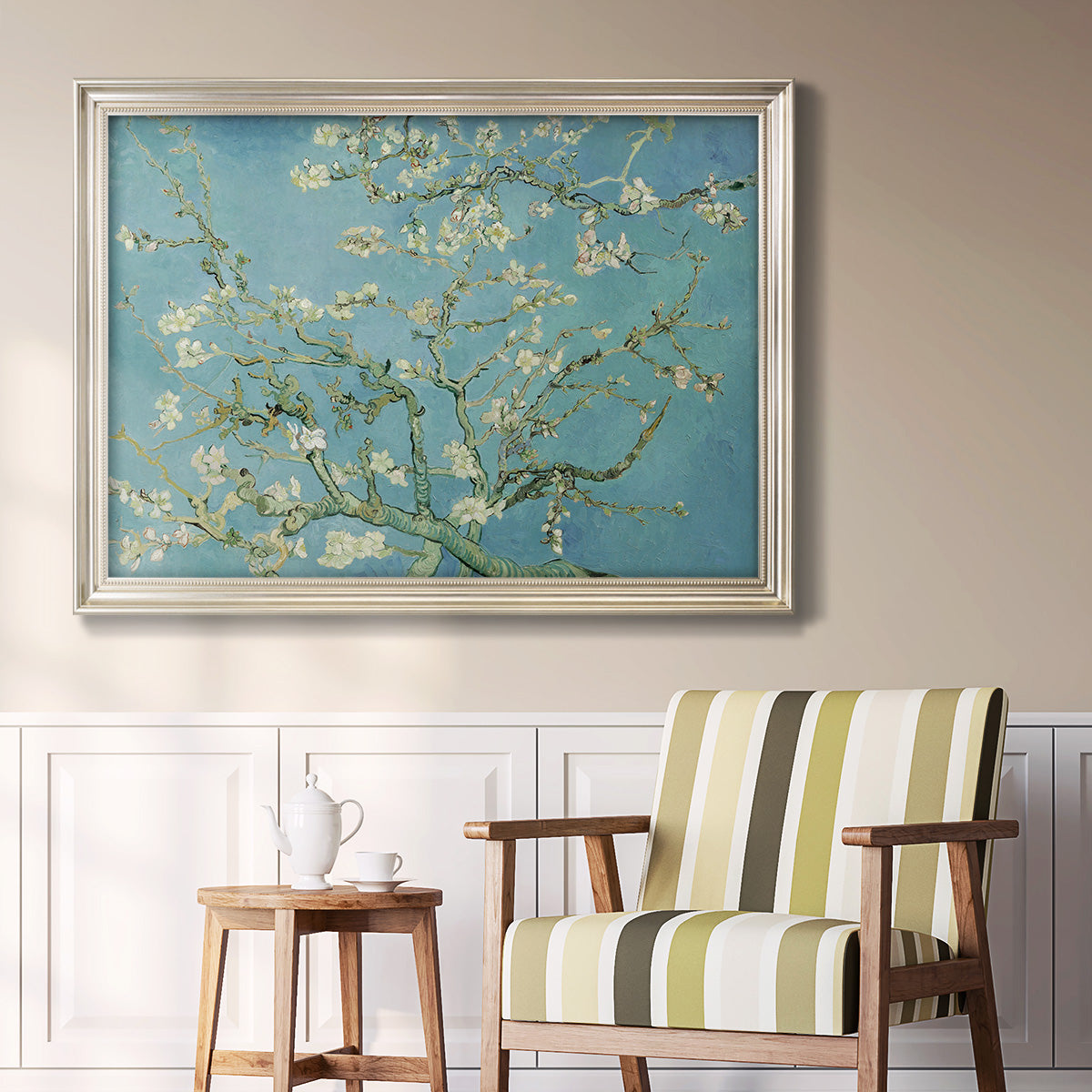 Impressionist flowering almond branch painting by Vincent van Gogh in an ornate champagne frame displayed in a light-toned interior setting.