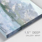 Close-up view of wrapped canvas corner featuring pastel mountain landscape view.