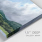 Close-up view of wrapped canvas corner featuring pastoral mountain landscape in blue.