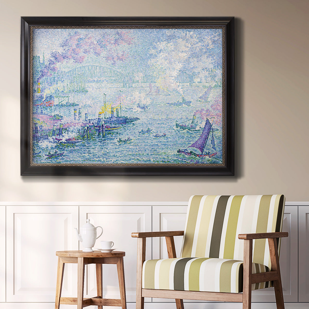 Impressionist industrial harbor scene by Paul Signac in an ornate black frame with gilded inner detail displayed in a light-toned interior setting.