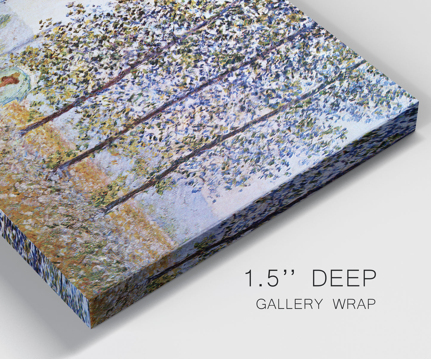 Close-up view of wrapped canvas corner featuring three poplar trees beside water.