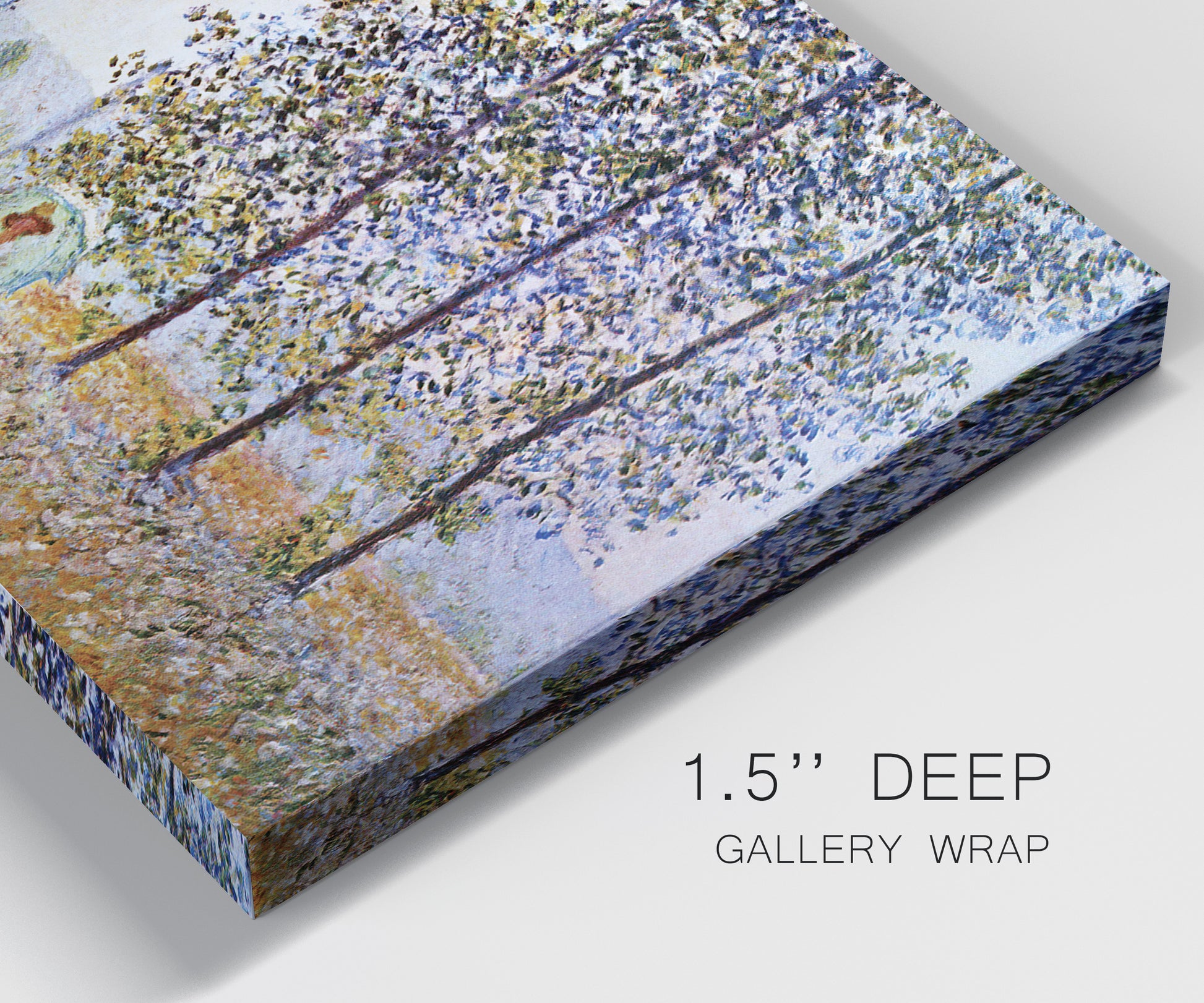 Close-up view of wrapped canvas corner featuring three poplar trees beside water.
