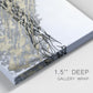 Close-up view of wrapped canvas corner featuring light modern abstract wind patterns.
