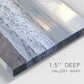 Close-up view of wrapped canvas corner featuring calm coastal shoreline seascape.