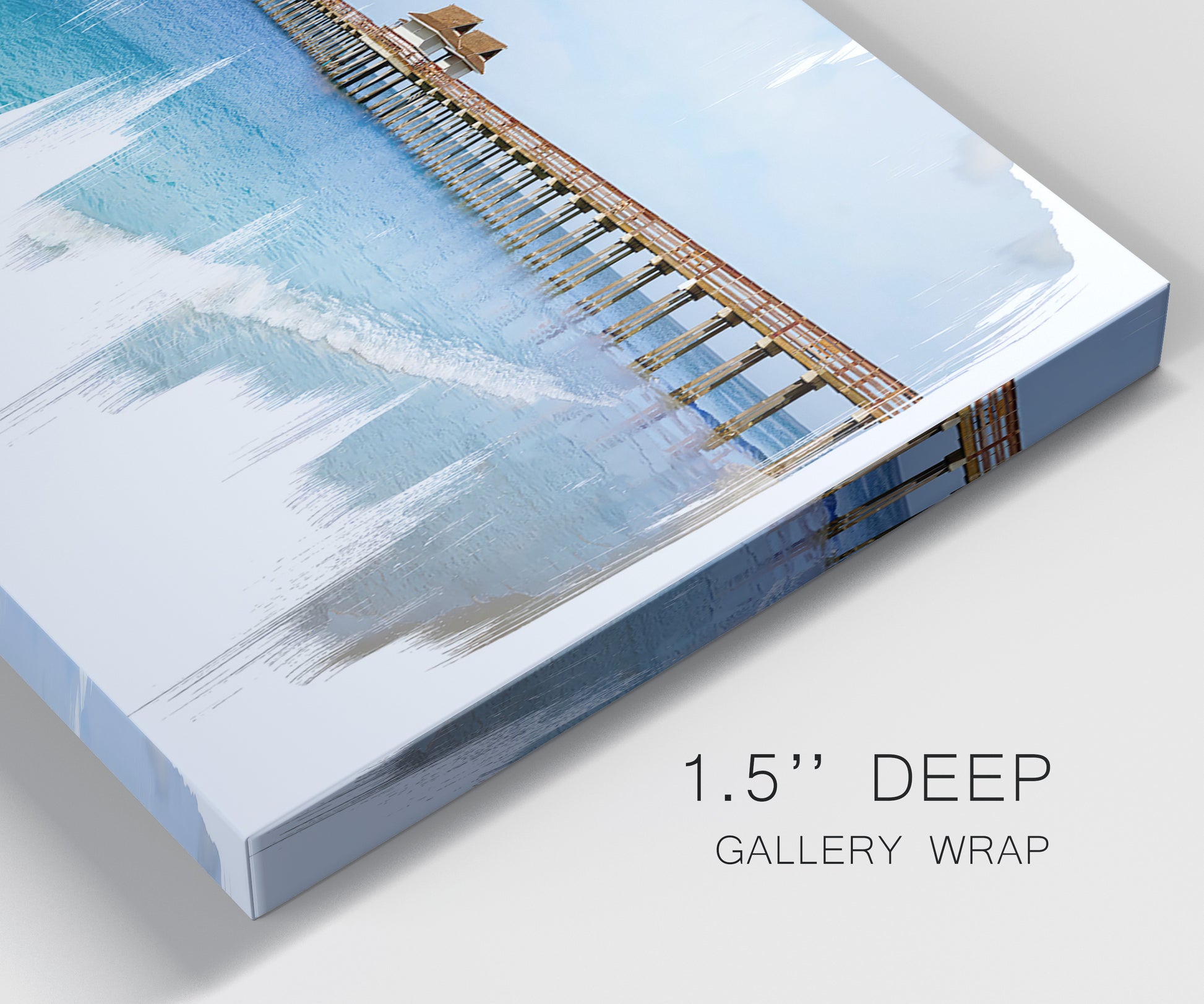 Close-up view of wrapped canvas corner featuring coastal pier extending over water.