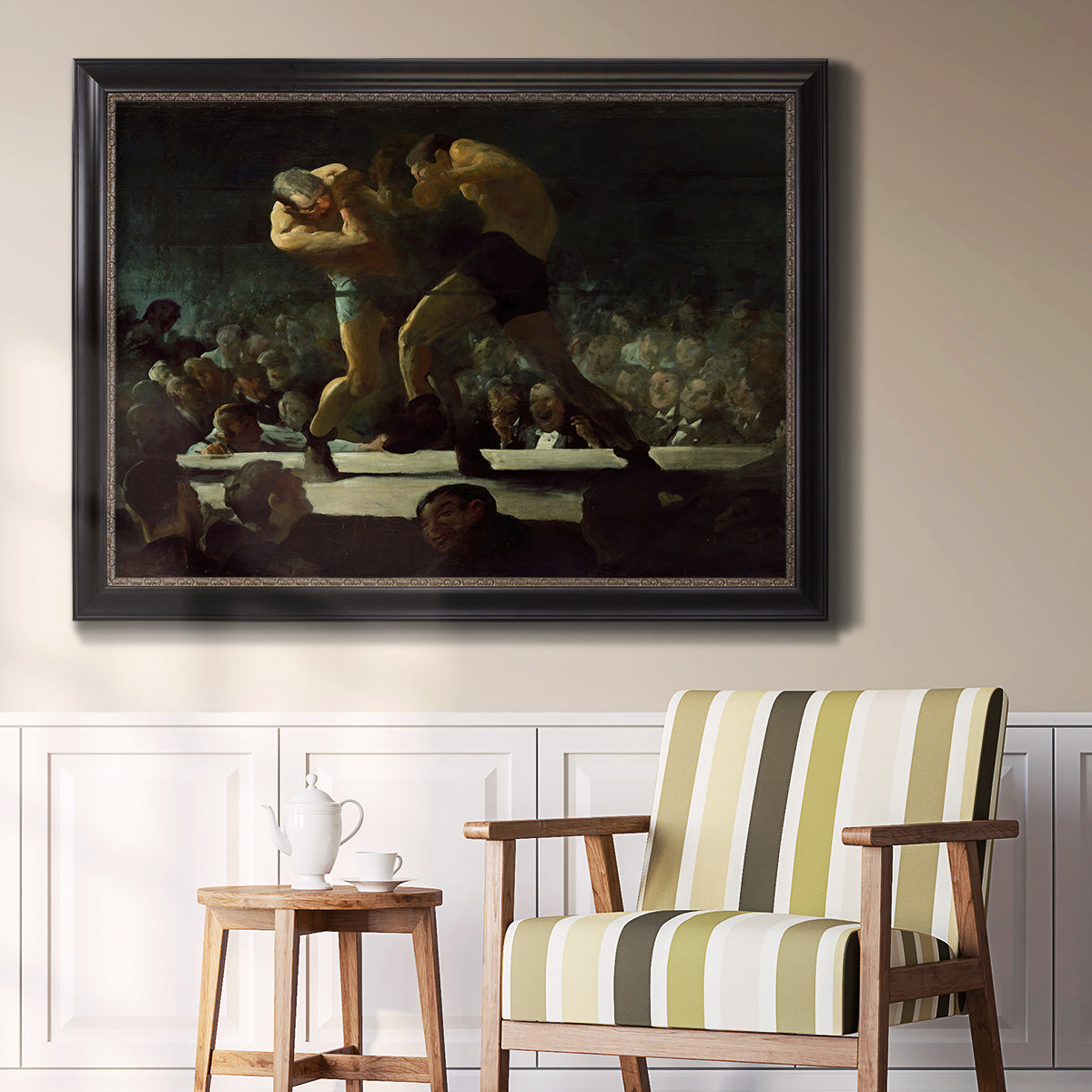 American social club scene painting by George Bellows in an ornate black frame with gilded inner detail displayed in a light-toned interior setting.