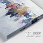 Close-up view of wrapped canvas corner featuring abstract water inspired composition.