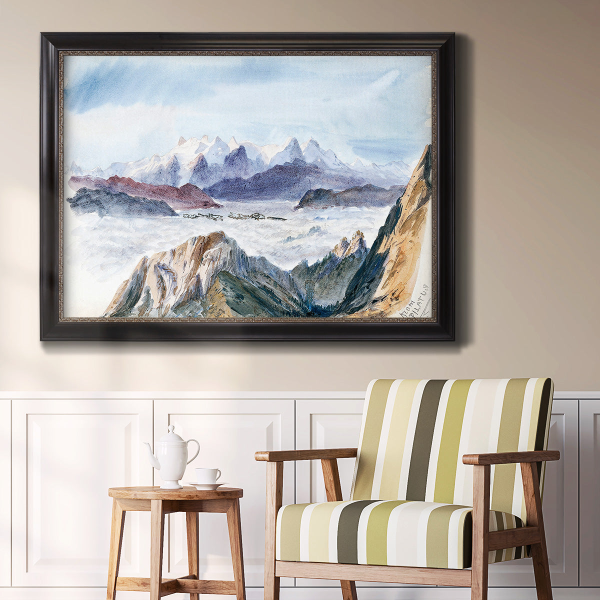 Impressionist alpine mountain landscape by John Singer Sargent in an ornate black frame with gilded inner detail displayed in a light-toned interior setting.