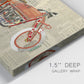 Close-up view of wrapped canvas corner featuring vintage red vehicle collage detail.