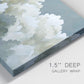 Close-up view of wrapped canvas corner featuring abstract evening landscape with depth.