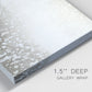 Close-up view of wrapped canvas corner featuring dark textured abstract mist.