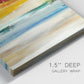 Close-up view of wrapped canvas corner featuring abstract divided color hemisphere forms.