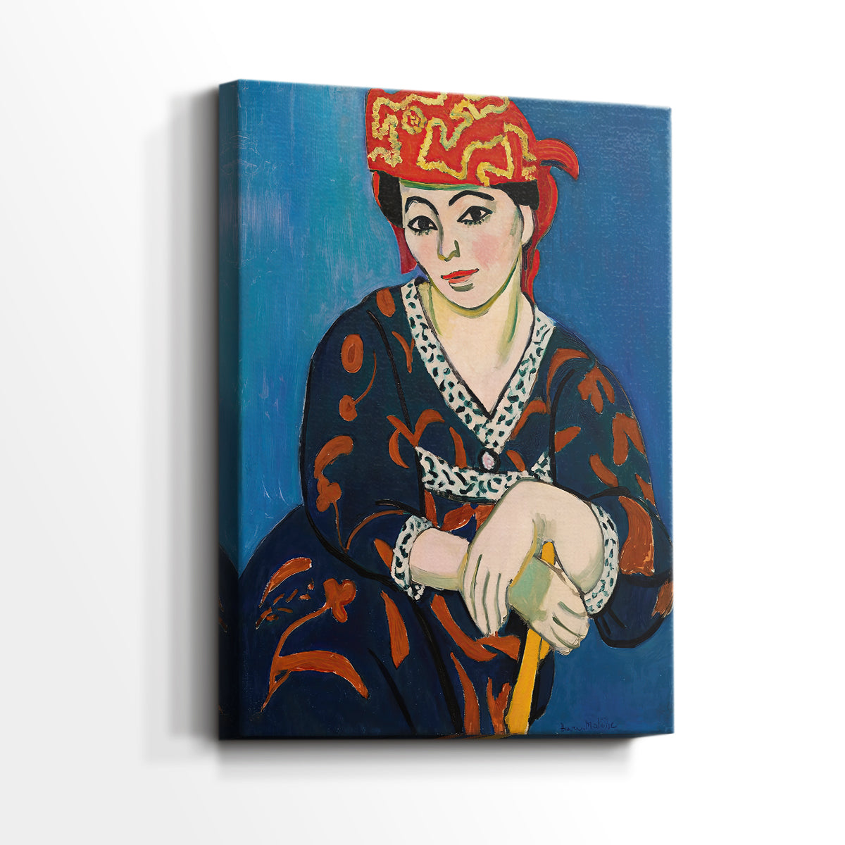 Side view of a canvas art print of a vibrant portrait with decorative headwear and strong color, showing gallery-wrapped depth.