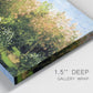 Close-up view of wrapped canvas corner featuring lush garden landscape with trees.
