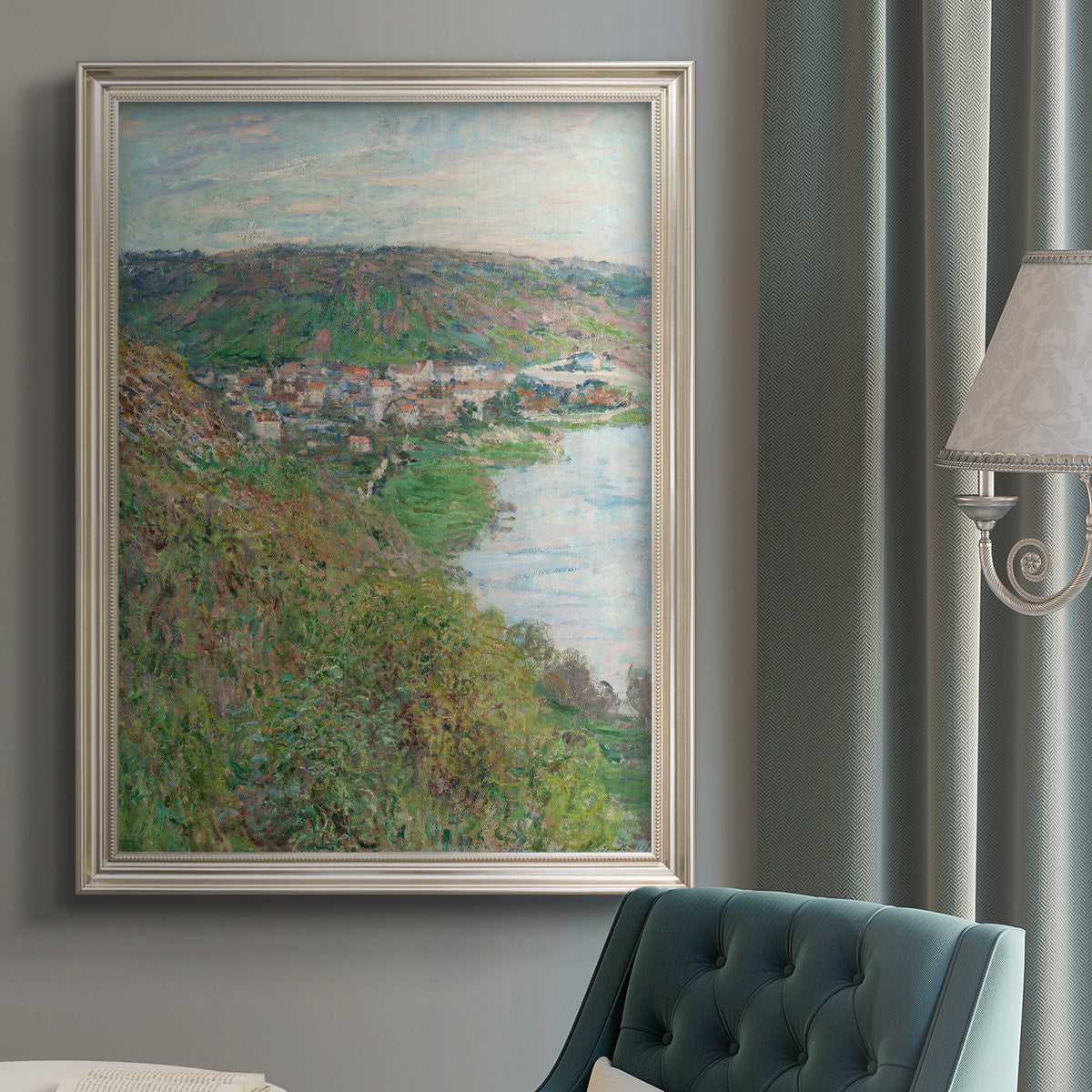 Impressionist landscape view of Vétheuil by Claude Monet in an {frame_style_descriptor} displayed in a neutral interior setting.