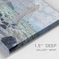 Close-up view of wrapped canvas corner featuring rough seas along rocky coast.