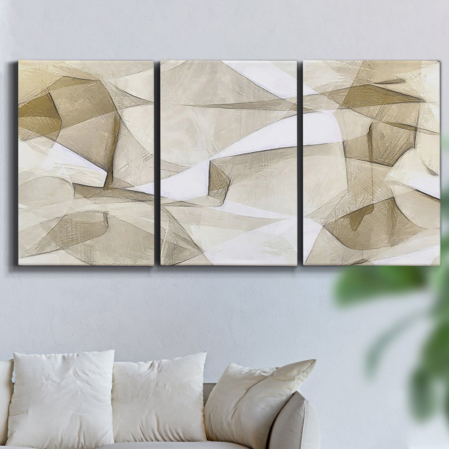 Three-panel canvas wall art featuring soft abstract meditative color balance, displayed in a living room above a sofa.