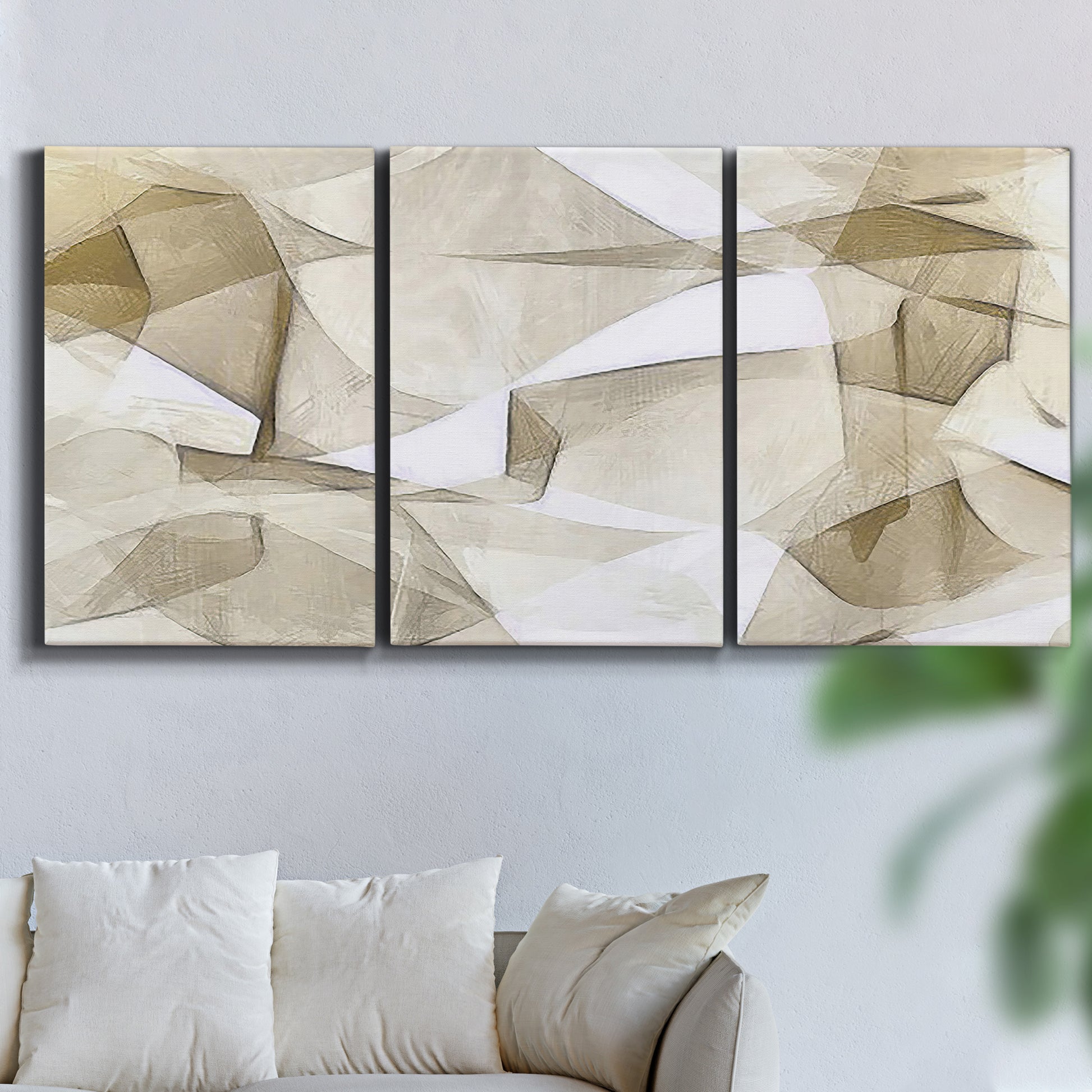 Three-panel canvas wall art featuring soft abstract meditative color balance, displayed in a living room above a sofa.